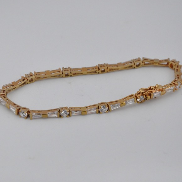 Avon Jewelry - Avon Tennis Bracelet Gold-tone Clear Excellent Baguette Round Crystals Link
